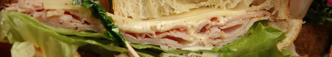 Eating Sandwich Bakery at M & M Bakery & Delicatessen restaurant in Kansas City, MO.